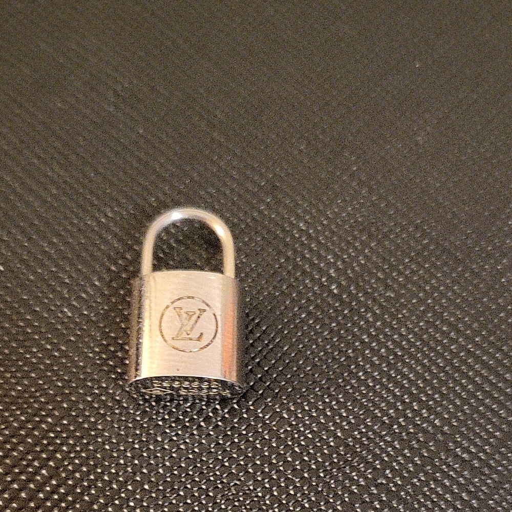 Louis Vuitton Metallic Silver Lock Necklace Pendant